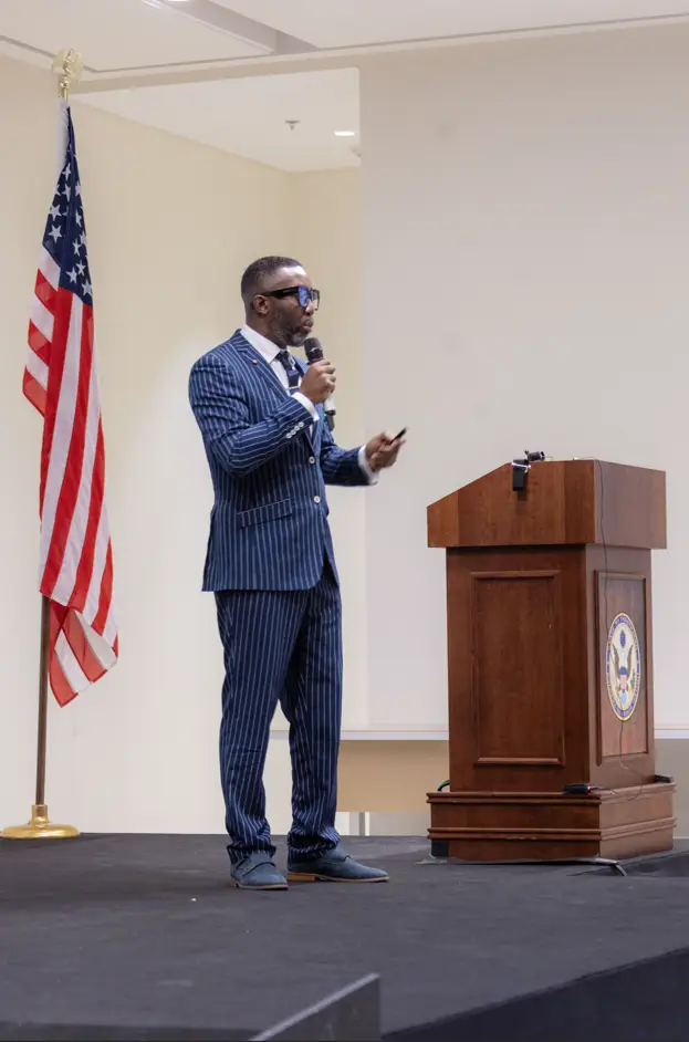 Kevin Bennett talks at the U.S. Embassy